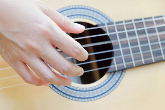 close up of playing guitar background