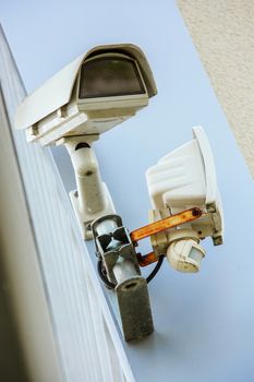 CCTV Security camera and urban video. Closeup view.