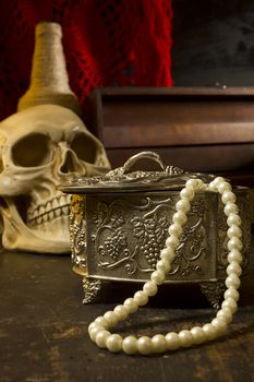 Vintage jewelry box on a wooden table