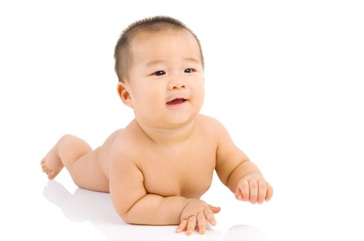 crawling cute asian baby boy in the studio