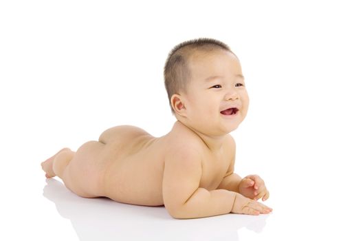 crawling cute asian baby boy in the studio