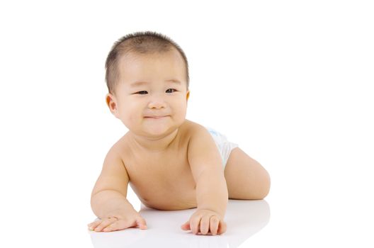 crawling cute asian baby boy in the studio