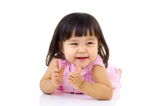 beautiful baby girl smilling and crawling on the floor