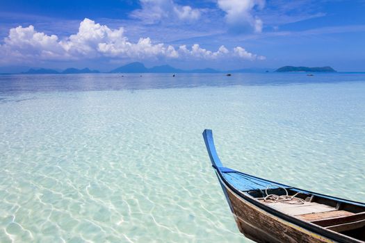 Fishing boat with sea,white Sand Beach at Kho Mat Sum Island Koh Samui, Thailand.