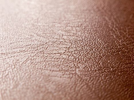 rough and smooth texture of brown leather up close studio