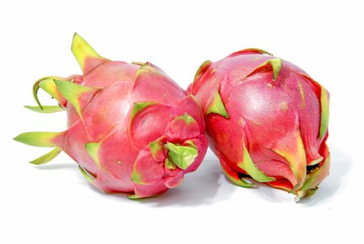 beautiful of two red dragon fruit on white background