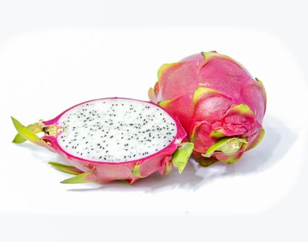beautiful red dragon fruit on white background