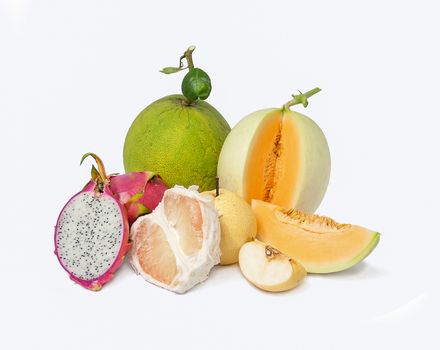 mix fruits, white chinese pear, green pomelo, red dragon fruit, orange cantaloupe on white background