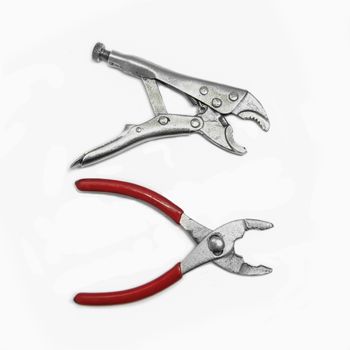 steel pliers and wrench for fix and useful on white background