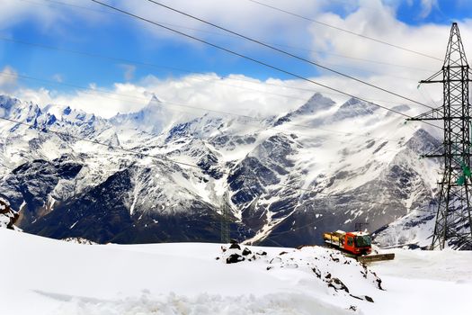 Snowmobile dune buggy vehicle in Caucasus mountains