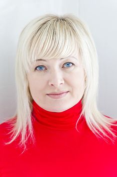 European blond woman with hair and blue eyes