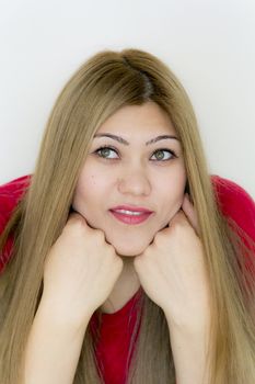 Attractive smiling young girl with straight hair and green eyes