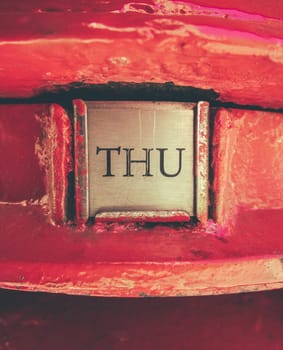 Retro Style Detail Of The Collection Sign On A Traditional Red British Royal Mail Post Box