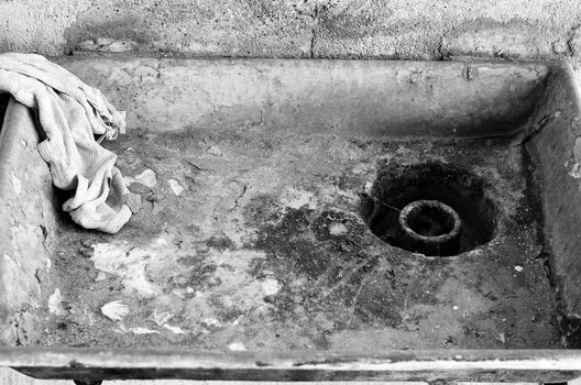 Old dirty metal rusty sink black and white theme