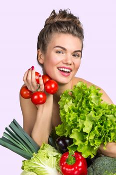 Happy smiling young woman with various vegetables