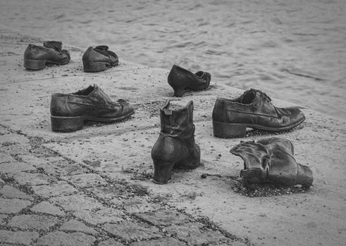 Close up on Iron shoes memorial to Jewish people executed WW2 in Budapest, Hungary