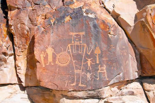 Petroglyph of a human figure at McKee Springs. This petroglyph is located in the monument about 20 miles away from the Visitors center.