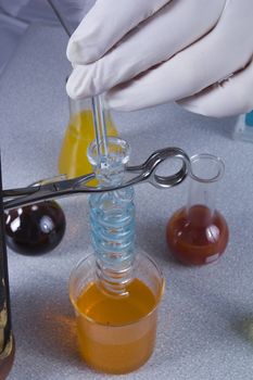 Hands chemist doing research in a laboratory