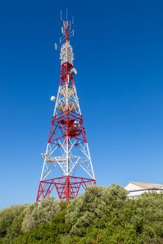 Communications tower with a beautiful blue sky on Puerto Real, Cadiz, Spain