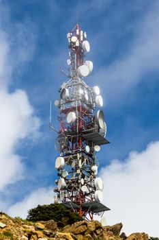 Big communications tower in a foggy day on Estepona, Malaga, Spain