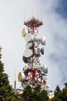 Big communications tower in a foggy day on Estepona, Malaga, Spain