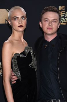 Cara Delevingne, Dane DeHaan at the 2017 MTV Movie & TV Awards, Arrivals, Shrine Auditorium, Los Angeles, CA 05-07-17