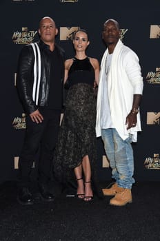 Vin Diesel, Jordana Brewster, Tyrese Gibson at the 2017 MTV Movie & TV Awards, Press Room, Shrine Auditorium, Los Angeles, CA 05-07-17