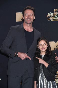 Hugh Jackman, Dafne Keen at the 2017 MTV Movie & TV Awards, Press Room, Shrine Auditorium, Los Angeles, CA 05-07-17