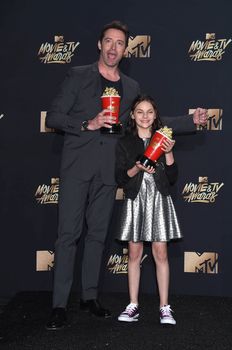 Hugh Jackman, Dafne Keen at the 2017 MTV Movie & TV Awards, Press Room, Shrine Auditorium, Los Angeles, CA 05-07-17