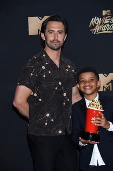 Milo Ventimiglia, Lonnie Chavis at the 2017 MTV Movie & TV Awards, Press Room, Shrine Auditorium, Los Angeles, CA 05-07-17