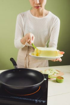 House wife wearing apron making. Steps of making cooking pancake.