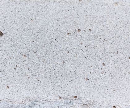 Abstract background texture of a concrete wall close-up