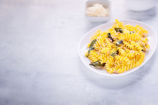 Fusilli pasta with sage and pine nuts. Gluten free. Flour from rice and corn flour