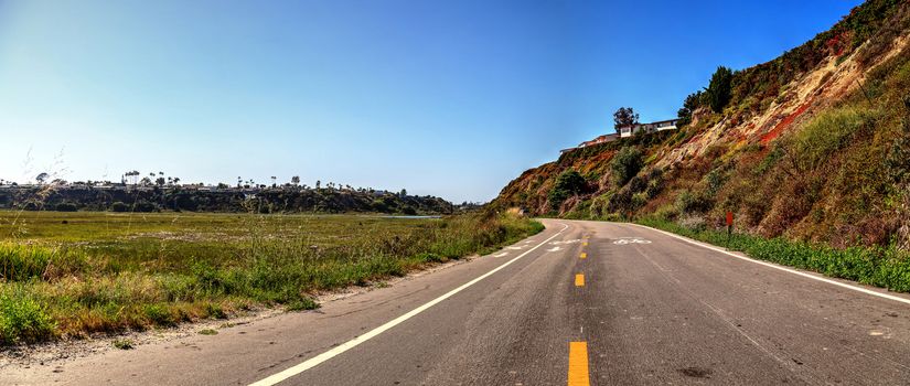 Newport Back Bay loop hiking trail winds along the marsh, where you will see wildlife in Newport Beach, California USA