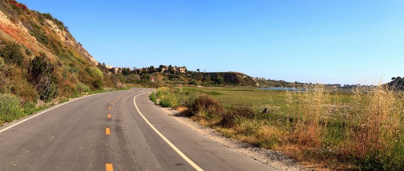 Newport Back Bay loop hiking trail winds along the marsh, where you will see wildlife in Newport Beach, California USA