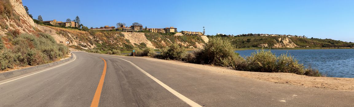 Newport Back Bay loop hiking trail winds along the marsh, where you will see wildlife in Newport Beach, California USA