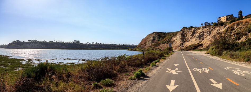 Newport Back Bay loop hiking trail winds along the marsh, where you will see wildlife in Newport Beach, California USA