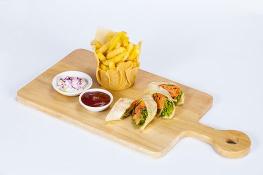 french fries potatoes with skin served with salt and herbs,Thai Fresh Spring Rolls.