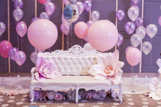 The sweet room with pink and purple balloon for Background.Romantic chair.
