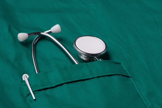 Closeup of a stethoscope on a medical uniform