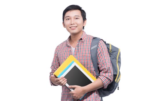 Portrait of young asian student holding books