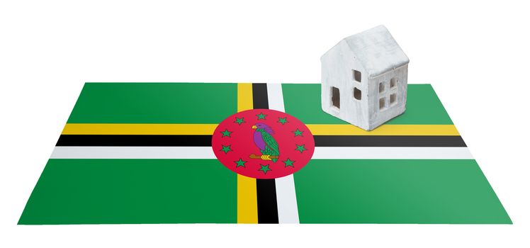 Small house on a flag - Living or migrating to Dominica