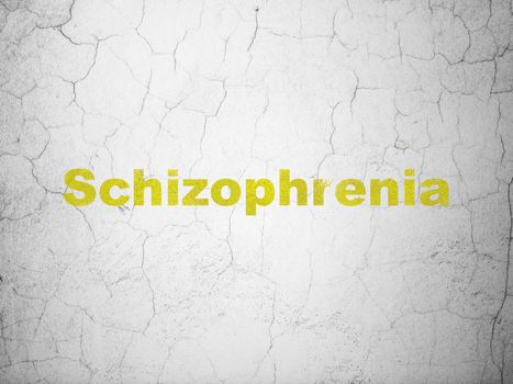 Medicine concept: Yellow Schizophrenia on textured concrete wall background