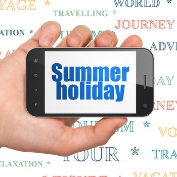 Tourism concept: Hand Holding Smartphone with  blue text Summer Holiday on display,  Tag Cloud background, 3D rendering