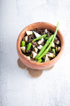 Black rice, apple and asparagus salad. Healthy food