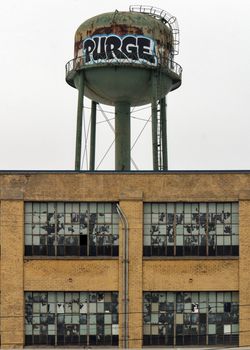 A graffiti-covered water tower in Saint Paul, Minnesota.