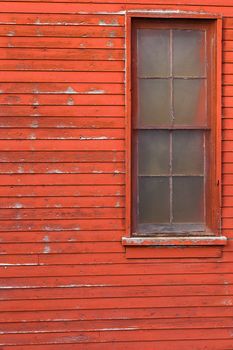 Window in a wall of an old water tower.