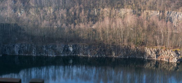 Panoramic view of an old open opencast mine of limestone works in Wuelfrath, Germany on a winter day.