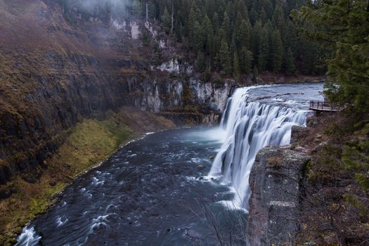 View of Upper Messa Falls from a boardwalk along the waterfall.