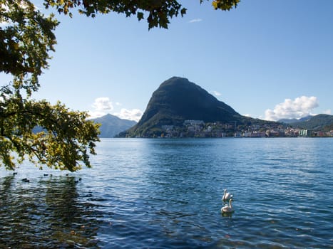 Lugano, Switzerland Parco Ciani and lake view, Monte San Salvatore and historical gate